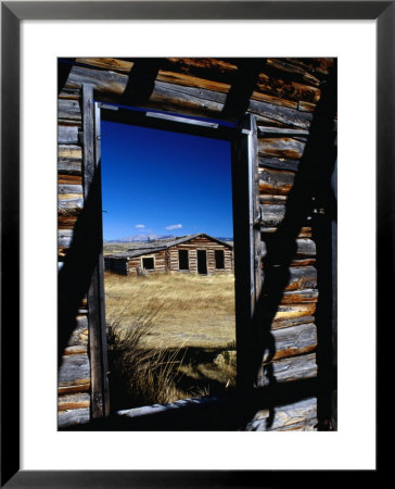 Hut Framed By Window Of Burnt Log Cabin, Wind River Country, Lander, Usa by Brent Winebrenner Pricing Limited Edition Print image