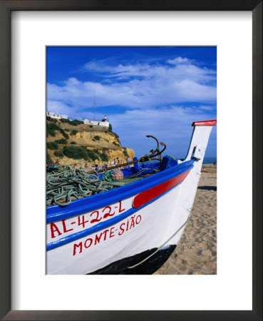 Traditional Painted Fishing Boat On Beach, Albufeira, Algarve, Portugal, by Roberto Gerometta Pricing Limited Edition Print image