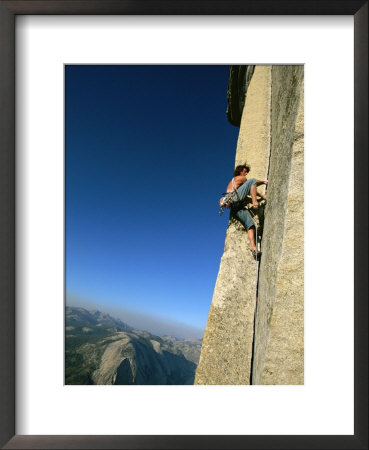 A Man Climbs Half Dome, Yosemite, California by Jimmy Chin Pricing Limited Edition Print image