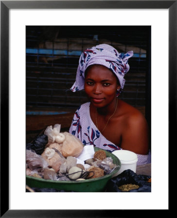 Female Spice Vendor At Market, Looking At Camera, Yamoussoukro, Cote D'ivoire by Pershouse Craig Pricing Limited Edition Print image