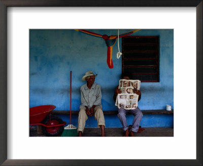 Coconut Farmers Sitting On Porch In Chichicapa, Mexico by Jeffrey Becom Pricing Limited Edition Print image