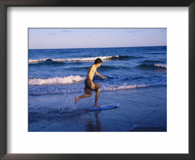 Young Boy Surfing by Terri Froelich Pricing Limited Edition Print image