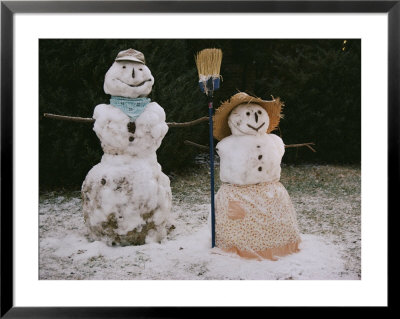 A Pair Of Cheerful Snow-People Dressed With Hats, Scarf, Apron, And Broom by Stephen St. John Pricing Limited Edition Print image