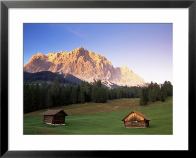 Zugspitze And Barns At Dusk, Wetterstein, Austrian Alps, Austria, Europe by Jochen Schlenker Pricing Limited Edition Print image