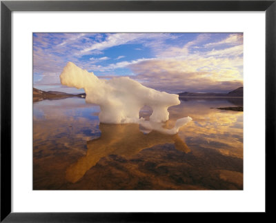 Small Iceberg Stranded On An Ellesmere Island Shore By An Ebb Tide by Paul Nicklen Pricing Limited Edition Print image