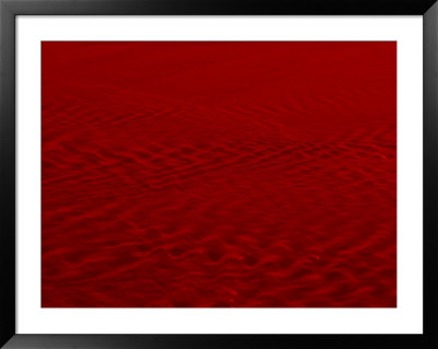 Ripples On The Surface Of Red-Hued Water by Raul Touzon Pricing Limited Edition Print image