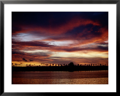 A Solomon Islands Sunset by Wolcott Henry Pricing Limited Edition Print image