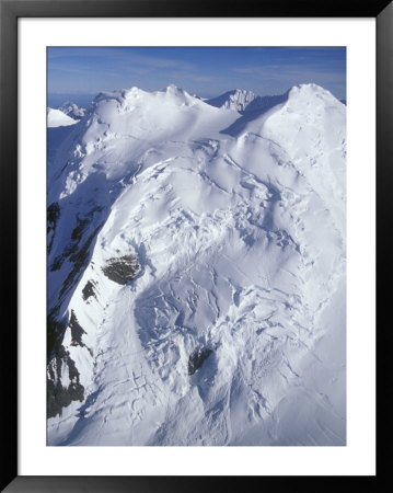 Aerial Of Snow Covered Peaks And Glaciers Near Mount Mckinley, Alaska by Rich Reid Pricing Limited Edition Print image