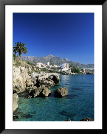 View Along Rock Coast To Town And Mountains, Nerja, Malaga, Andalucia, Spain, Mediterranean by Ruth Tomlinson Pricing Limited Edition Print image