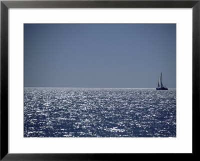 A Lone Sailboat On The Horizon In Shark Bay by Jason Edwards Pricing Limited Edition Print image