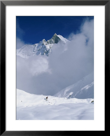 Man Hiking Down From Annapurna Base Camp Into The Clouds, Nepal by Skip Brown Pricing Limited Edition Print image