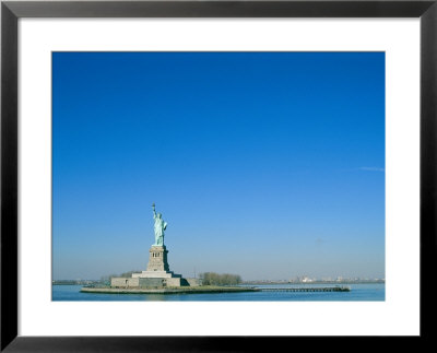 A Frontal View Of The Statue Of Liberty And Ellis Island by Norbert Rosing Pricing Limited Edition Print image