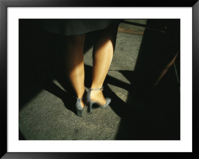Legs Of A Walking Woman Wearing Stockings And Gray High Heeled Shoes by Eightfish Pricing Limited Edition Print image