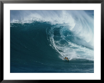 A Surfer Rides A Powerful Wave Off The North Shore Of Maui Island by Patrick Mcfeeley Pricing Limited Edition Print image