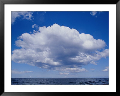 White, Fluffy Clouds Form Above The Water At Twofold Bay In Australia by Jason Edwards Pricing Limited Edition Print image