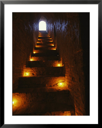 Narrow Staircase Lit With Candles Inside Dhamma-Yan-Gyi Temple by Richard Nowitz Pricing Limited Edition Print image