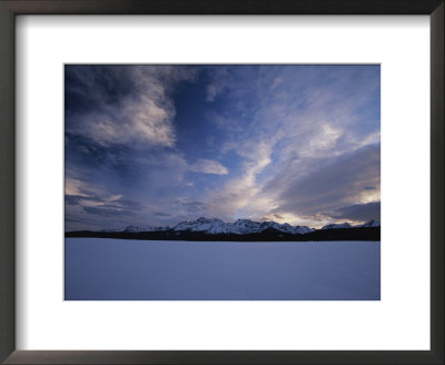 Clouds Fill The Sky Over The Snowy Sawtooth Range by Michael Melford Pricing Limited Edition Print image