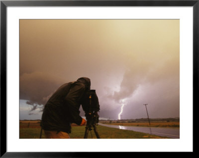 A Photographer Takes A Shot Of A Lightning Bolt by Peter Carsten Pricing Limited Edition Print image