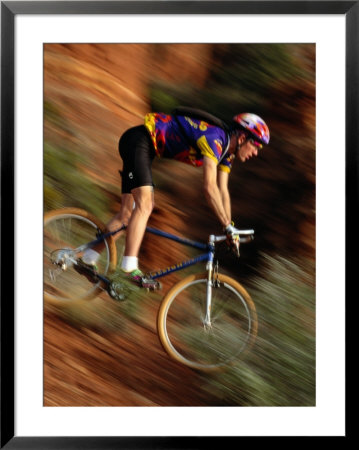 A Man Mountain Biking Near Sedona by Bill Hatcher Pricing Limited Edition Print image