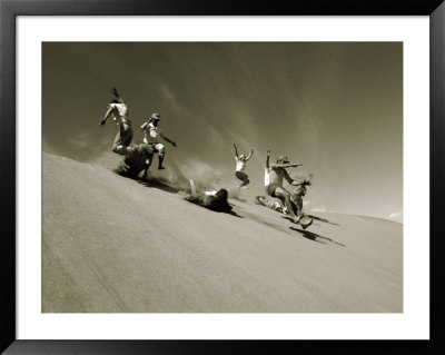 A Group Of Hikers Have A Freefall Down A Sand Dune Near The Alsek River In Alas Ka by Barry Tessman Pricing Limited Edition Print image