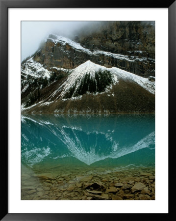 Fog Lifting From Lake Louise by Raymond Gehman Pricing Limited Edition Print image