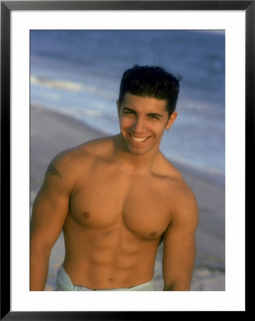Portrait Of Young Man With Out Shirt On The Beach by Henryk T. Kaiser Pricing Limited Edition Print image