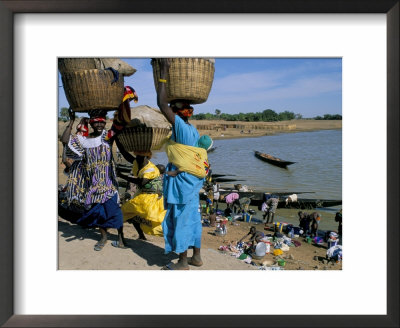 Women With Baskets Of Laundry On Their Heads Beside The River, Djenne, Mali, Africa by Bruno Morandi Pricing Limited Edition Print image