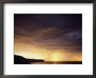Clouds And Rain At Twilight Over The Valdez Peninsula by Bill Curtsinger Pricing Limited Edition Print image
