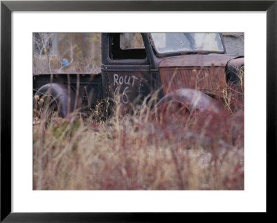 An Abandoned Old Truck Sits In A Field Of Autumn Colored Grasses by Roy Gumpel Pricing Limited Edition Print image