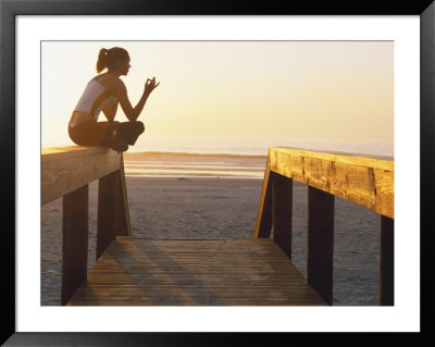 Woman Doing Yoga At Beach During Sunrise by Kevin Radford Pricing Limited Edition Print image