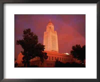 A Rainbow Shines Over The Nebraska State Capitol After A Storm by Joel Sartore Pricing Limited Edition Print image