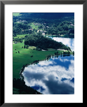Cloud Reflecting In Eastern Lake Bohinj With Ribcev Laz In Background, Bohinj, Slovenia by Martin Moos Pricing Limited Edition Print image