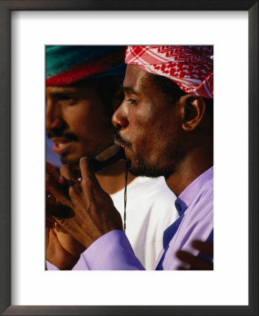 Musician Playing Instrument, United Arab Emirates by Chris Mellor Pricing Limited Edition Print image
