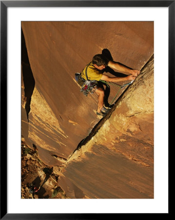 Ralph Ferrara Climbing A Rock Wall In The Utah Desert by Bill Hatcher Pricing Limited Edition Print image