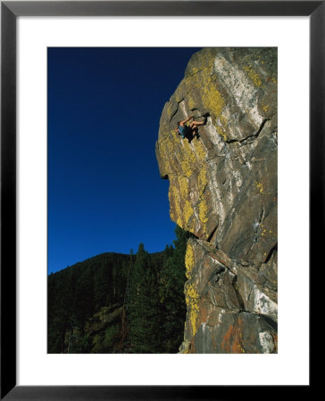 A Rock Climber Solo Climbs In Montanas Hyalite Canyon by Gordon Wiltsie Pricing Limited Edition Print image