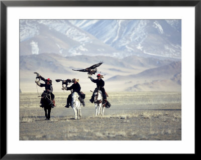 Eagle Hunters Dalai Khan, Takhuu Grandfather, Son Kook Kook, Golden Eagle Festival, Mongolia by Amos Nachoum Pricing Limited Edition Print image