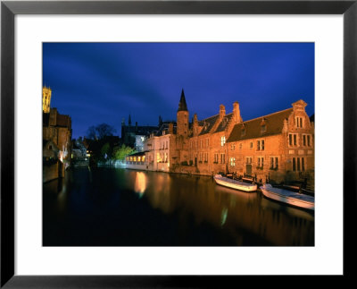 Dijver Lit Up At Dusk With St. Saviour Cathedral In Background, Bruges, West-Vlaanderen, Belgium by Martin Moos Pricing Limited Edition Print image