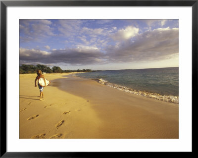 Young Man Walking On Makena Beach At Sunset, Maui, Hawaii, Usa by Darrell Gulin Pricing Limited Edition Print image