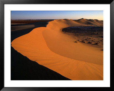 A Sand Dune Rises Out Of The Sahara Desert, Ghadhames, Libya by Doug Mckinlay Pricing Limited Edition Print image