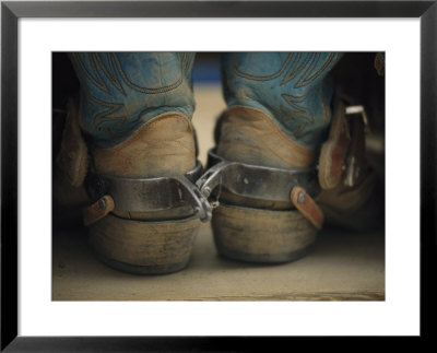 Close Up Detail Of Cowboy Boots With Well-Worn Spurs by Bobby Model Pricing Limited Edition Print image