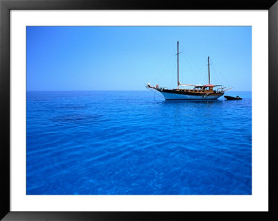 Yacht Anchored In Waters Of Gulf Of Orosei, Sardinia, Italy by Dallas Stribley Pricing Limited Edition Print image