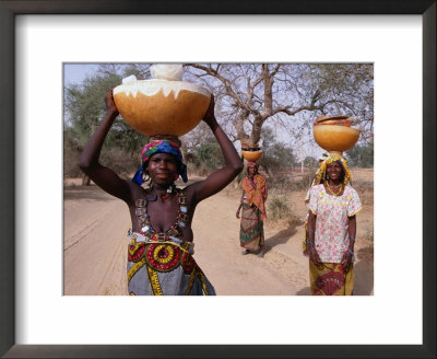 Women Returning With Water From Well, Niger by Oliver Strewe Pricing Limited Edition Print image