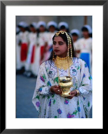 Girl With Gold Offerings For Dignitaries, Dubai, United Arab Emirates by Chris Mellor Pricing Limited Edition Print image