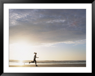 Woman Running On Beach At Sunrise by Kevin Radford Pricing Limited Edition Print image