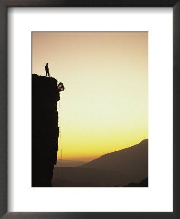 Climber Stands Atop A Cliff At The End Of The Universe by Bill Hatcher Pricing Limited Edition Print image