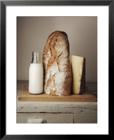 Milk Bottle, Bread And Cheese On A Wooden Cupboard by Joerg Lehmann Pricing Limited Edition Print image