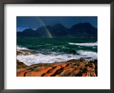 Rainbow Dipping Into Coles Bay During Stormy Weather, Freycinet National Park, Tasmania, Australia by Grant Dixon Pricing Limited Edition Print image