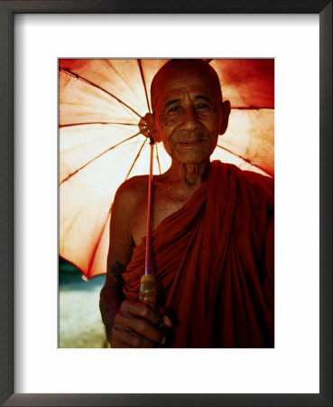 Smiling Monk Holding Umbrella, Mrauk U, Myanmar (Burma) by Frank Carter Pricing Limited Edition Print image