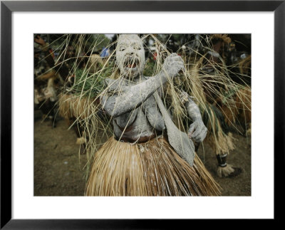 A Dancer At Annual Tribal Sing-Sing Demonstrates The Mourning Ritual Of Covering Her Body In Ash by Jodi Cobb Pricing Limited Edition Print image