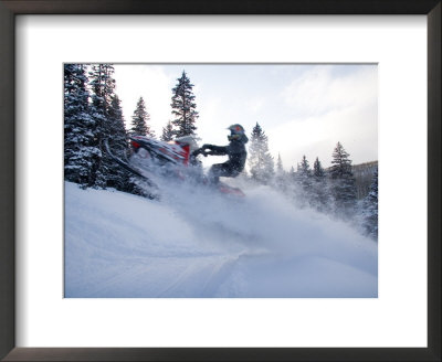 A Man Jumps Across A Road In The Backwoods Of Utah's Mountains by Taylor S. Kennedy Pricing Limited Edition Print image